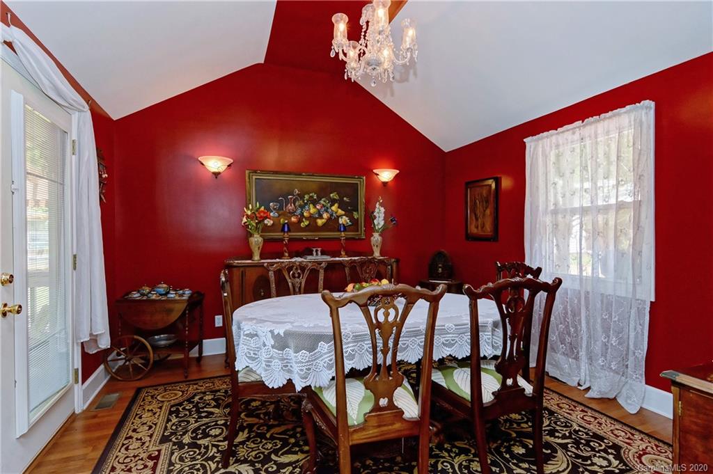 5700 Paw Creek Road Charlotte, NC 28214 - Photo 9 of 19 a table and chairs in a room