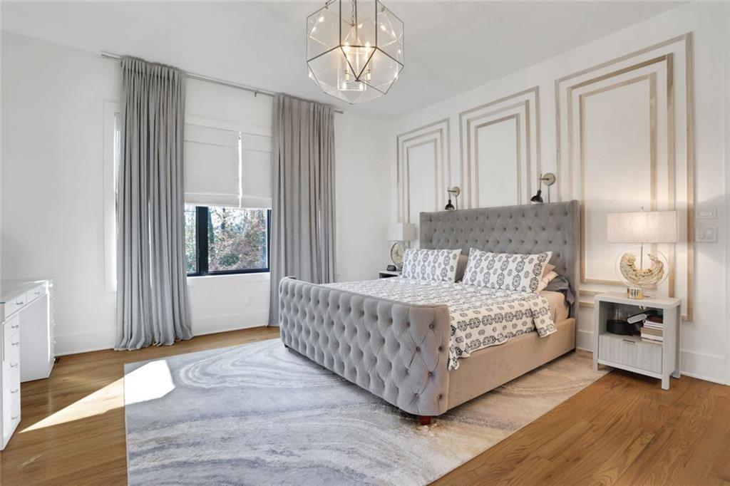 1200 Moores Mill Road Northwest Atlanta, GA 30327 - Photo 37 of 73 a living room with a bed furniture and a window