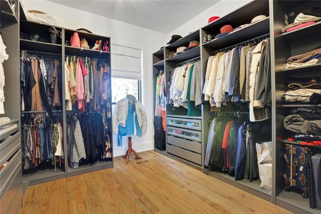 1200 Moores Mill Road Northwest Atlanta, GA 30327 - Photo 49 of 73 a view of walk in closet with clothes and shoes