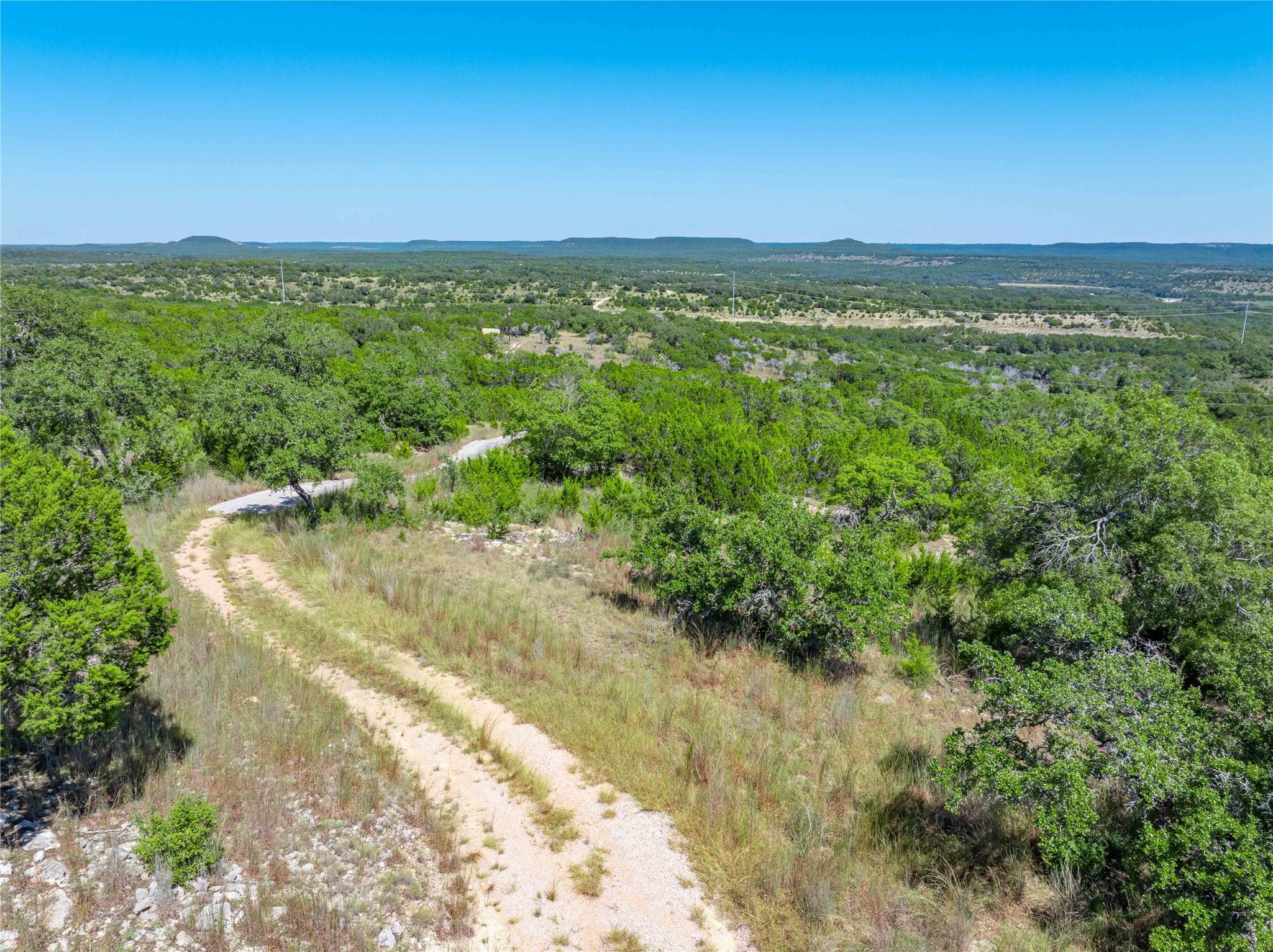 0 Post Oak Bend Loop Marble Falls, TX 78654 - Photo 1 of 18 a view of a lake with a city
