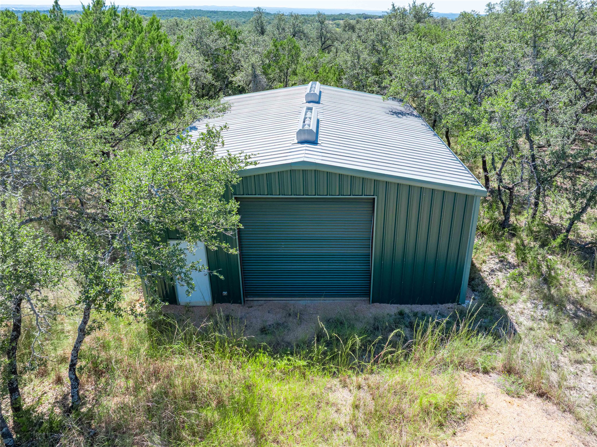 0 Post Oak Bend Loop Marble Falls, TX 78654 - Photo 11 of 18 a backyard of a house with lots of green space