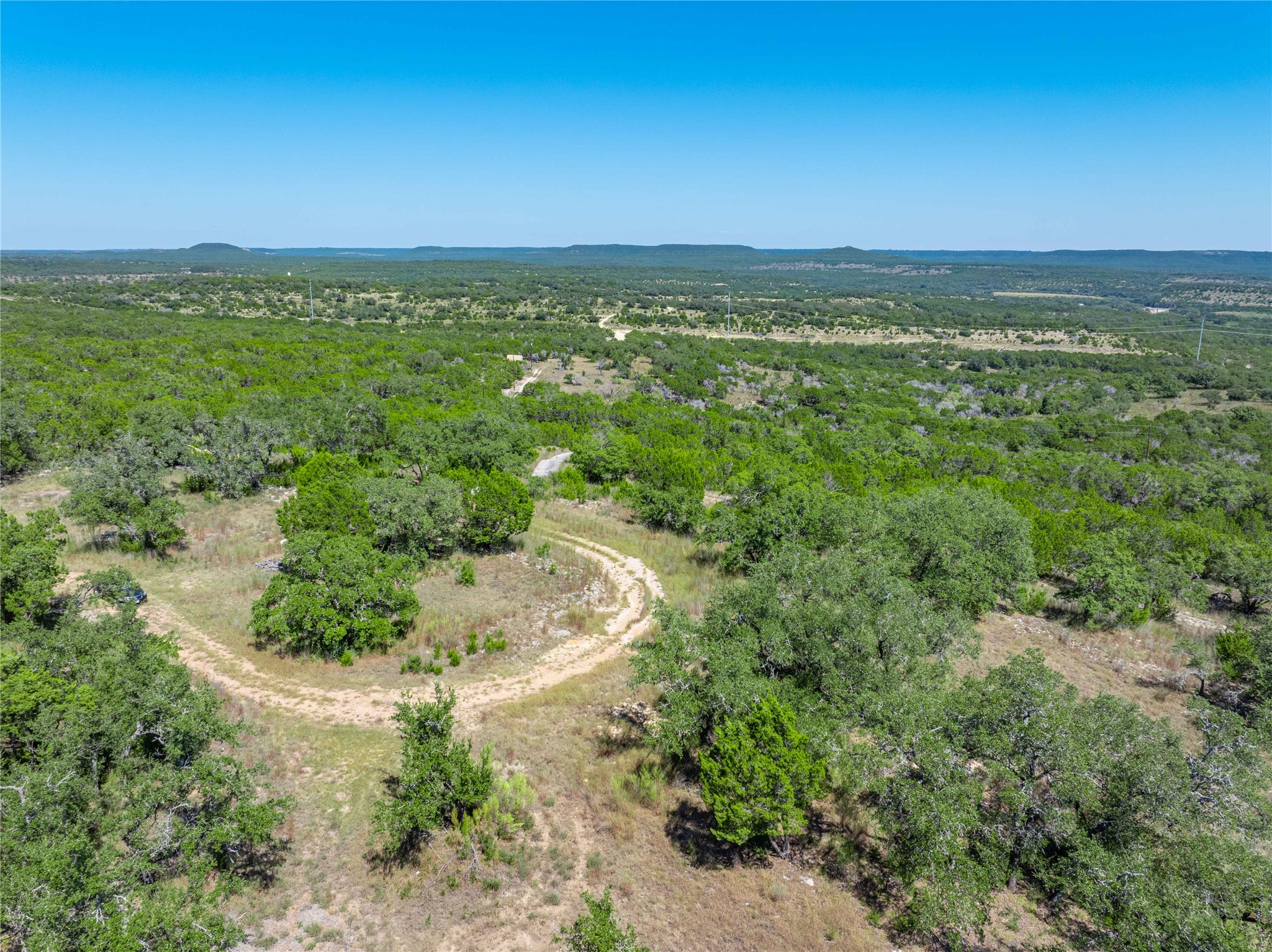 0 Post Oak Bend Loop Marble Falls, TX 78654 - Photo 17 of 18 an aerial view of residential houses with outdoor space and trees