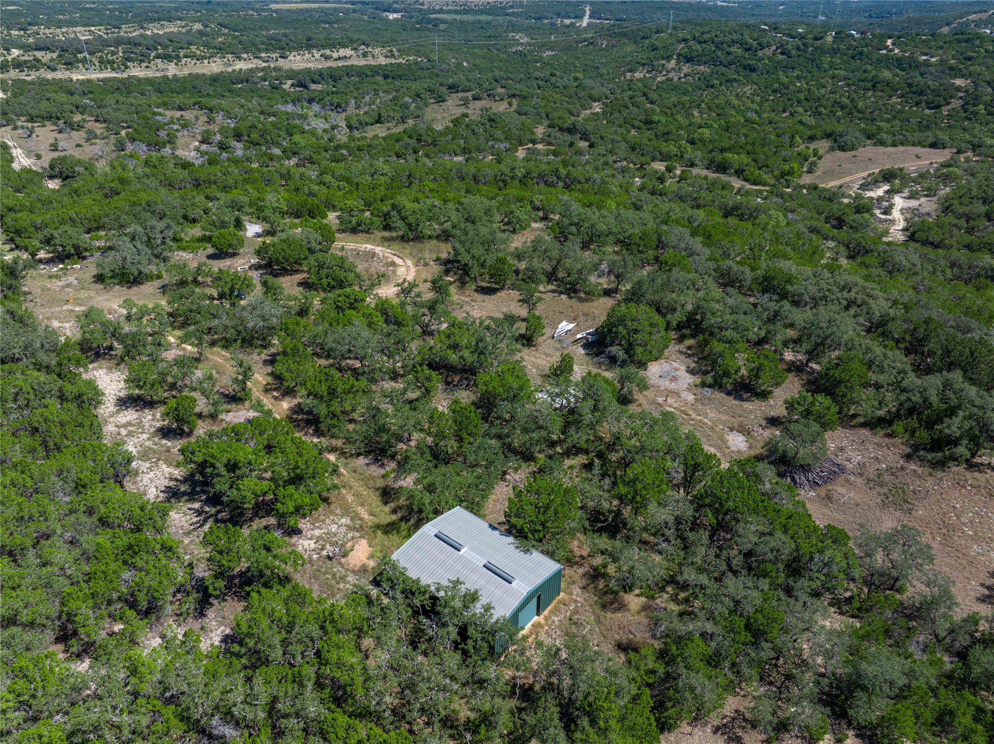 0 Post Oak Bend Loop Marble Falls, TX 78654 - Photo 5 of 18 an aerial view of residential house with outdoor space and trees all around
