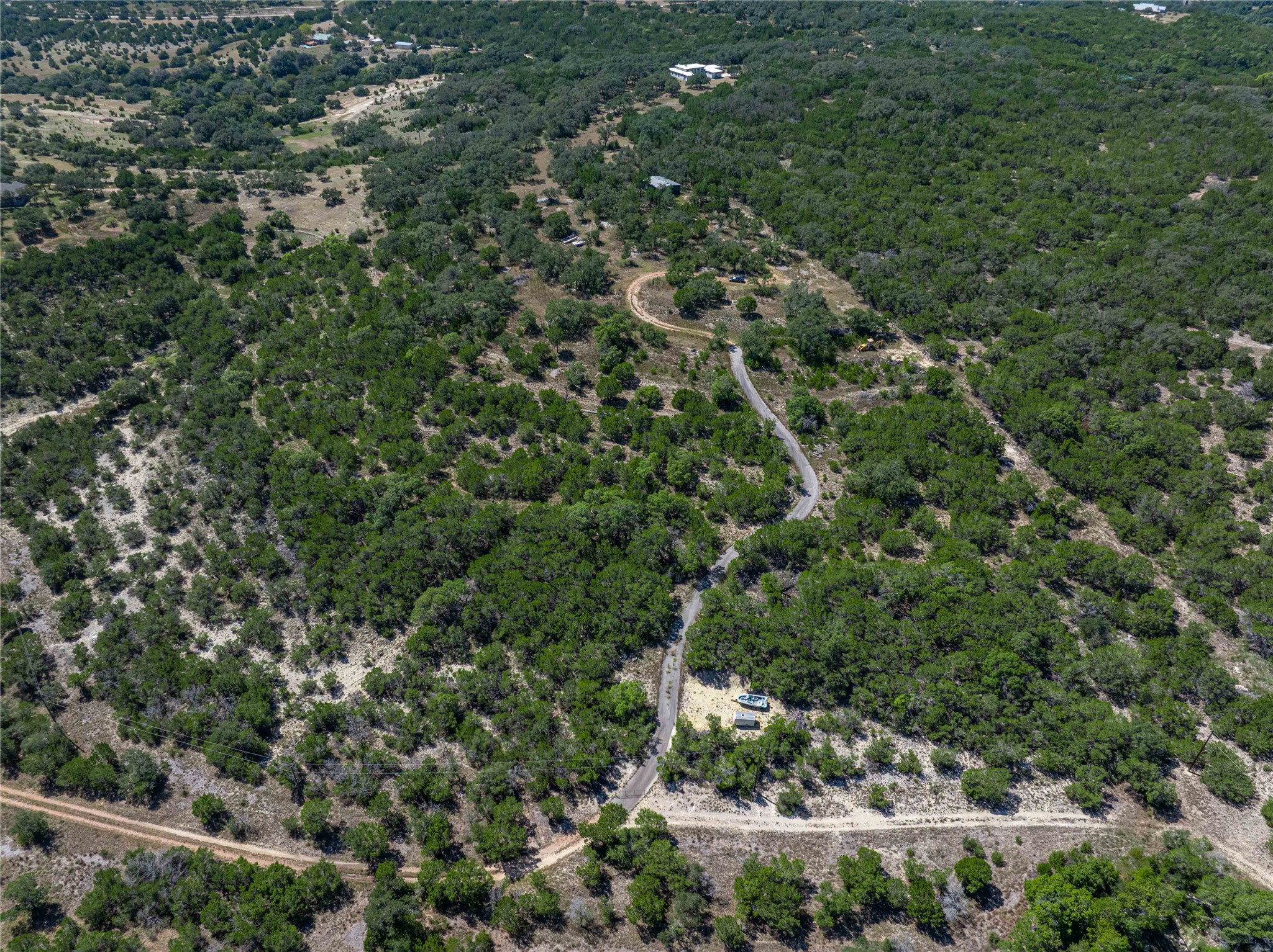 0 Post Oak Bend Loop Marble Falls, TX 78654 - Photo 9 of 18 an aerial view of residential house with outdoor space and trees all around