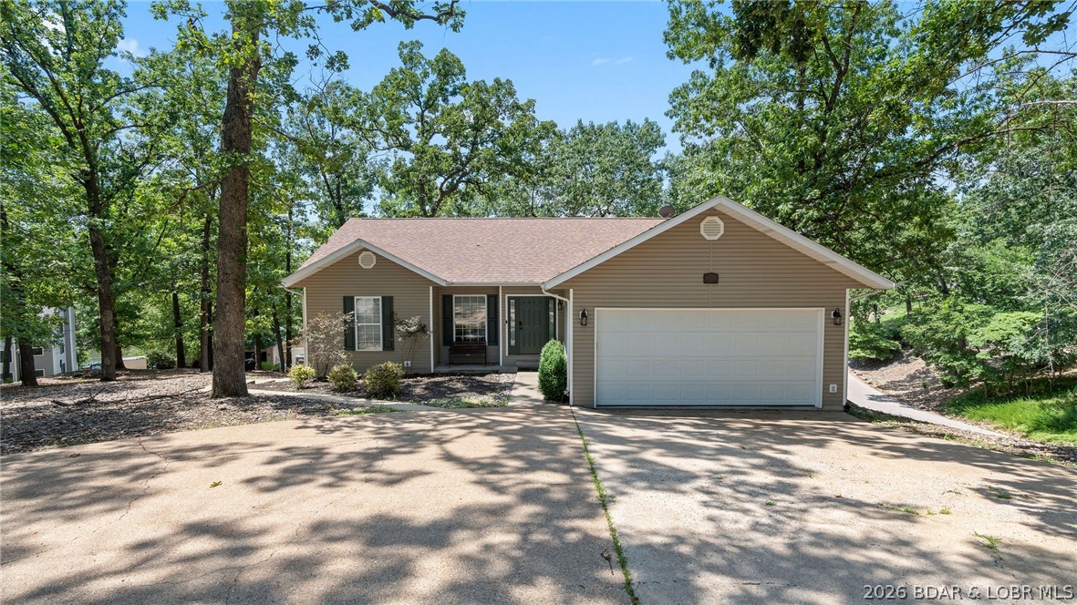 1500 Swiss Village Road Osage Beach, MO 65065 - Photo 1 of 93 Front of home