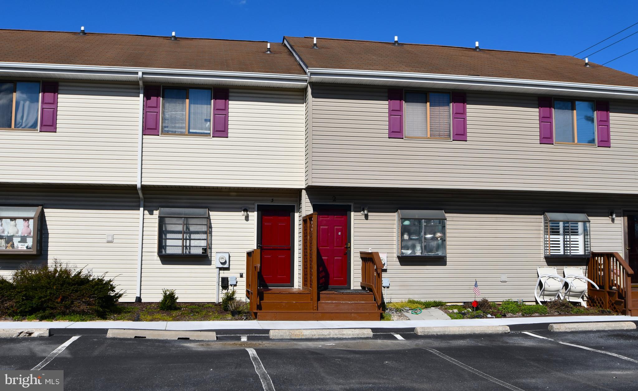 9815 Stephen Decatur Highway, Unit 3 Ocean City, MD 21842 - Photo 1 of 23 a front view of a house