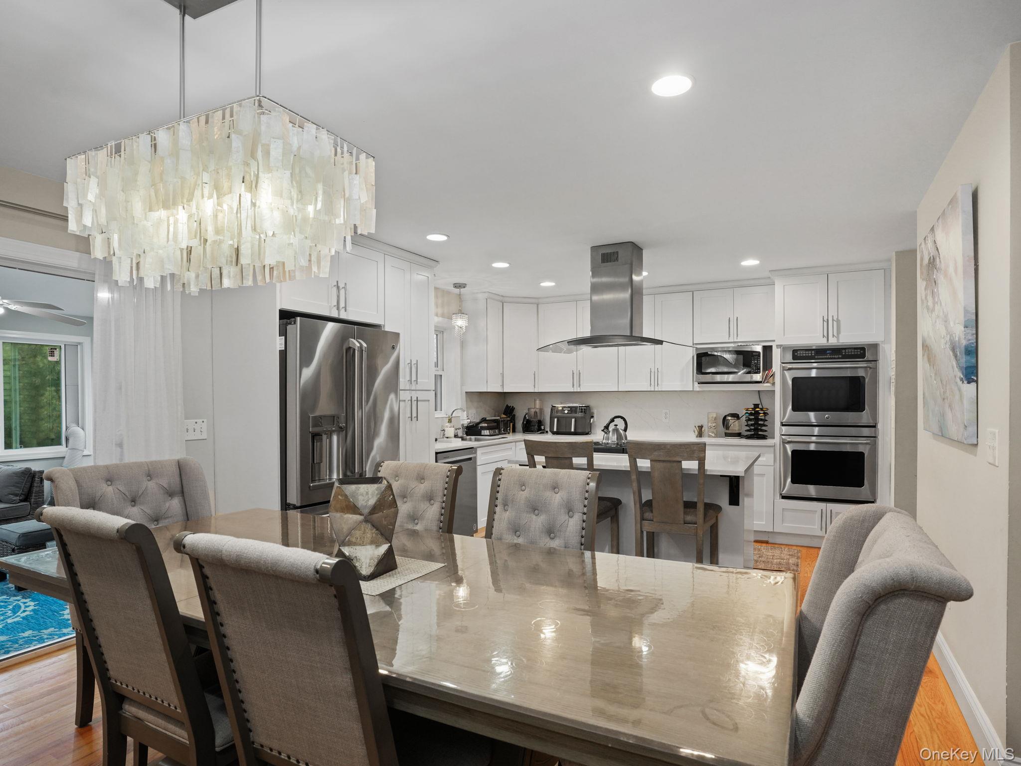 38 Kathwood Road White Plains, NY 10607 - Photo 11 of 44 Dining room with light wood-style flooring and recessed lighting