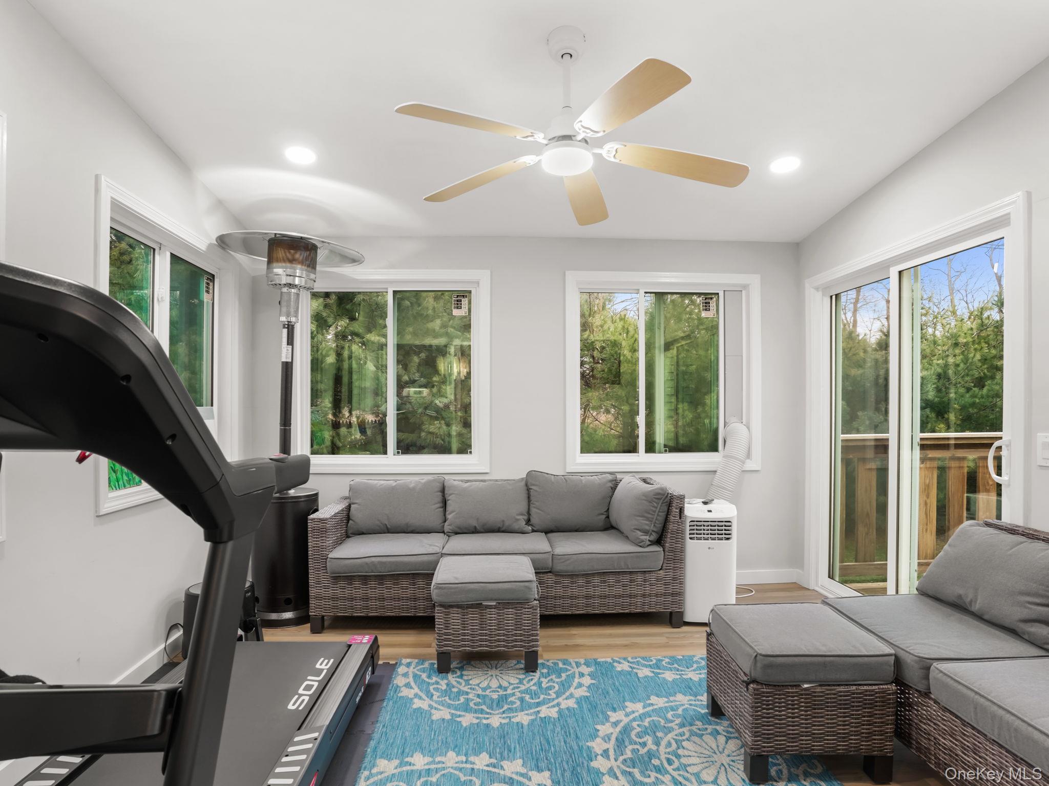 38 Kathwood Road White Plains, NY 10607 - Photo 20 of 44 Enclosed deck featuring wood finished floors, recessed lighting, and a ceiling fan