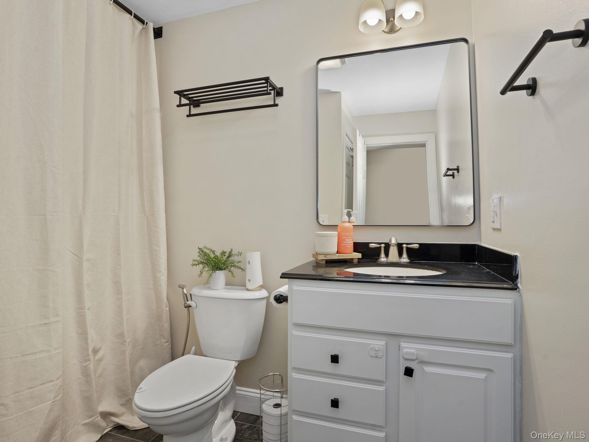 38 Kathwood Road White Plains, NY 10607 - Photo 21 of 44 Hallway Full bathroom with vanity and a shower with curtain