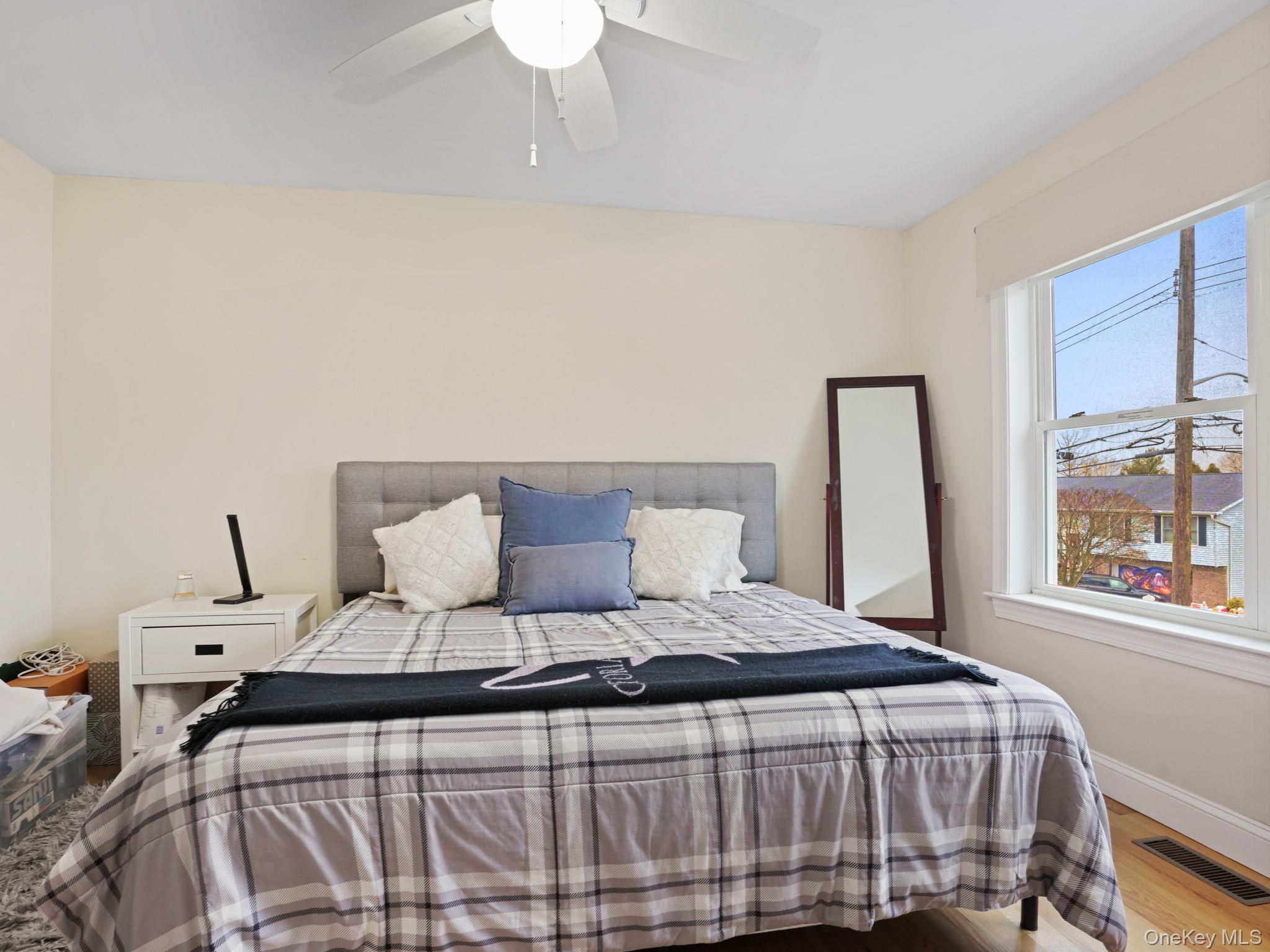 38 Kathwood Road White Plains, NY 10607 - Photo 25 of 44 Bedroom featuring wood finished floors and a ceiling fan