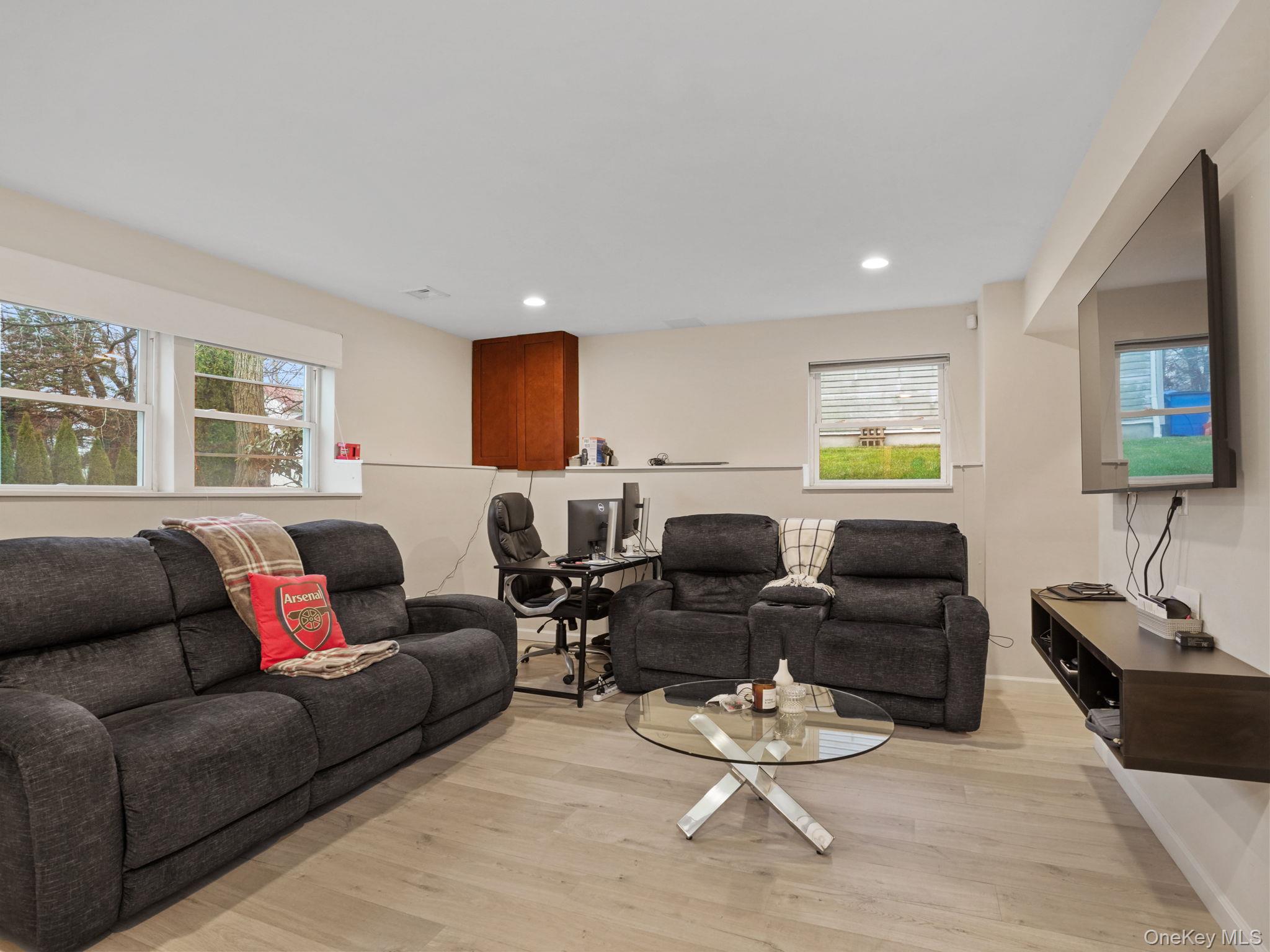 38 Kathwood Road White Plains, NY 10607 - Photo 31 of 44 Den featuring light wood-type flooring, plenty of natural light, and recessed lighting