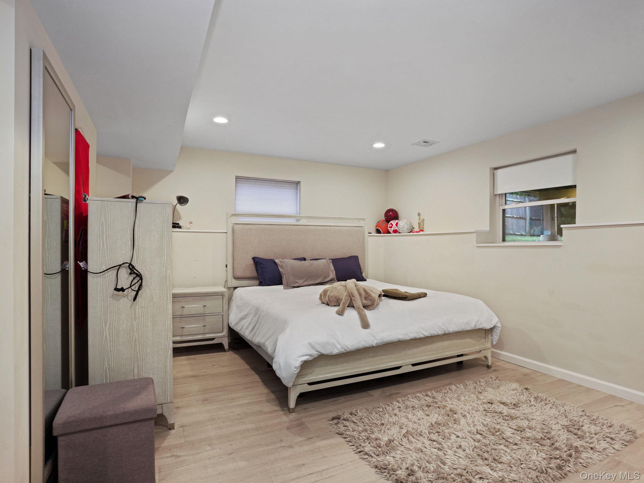 38 Kathwood Road White Plains, NY 10607 - Photo 34 of 44 Bonus room with light wood-type flooring and recessed lighting