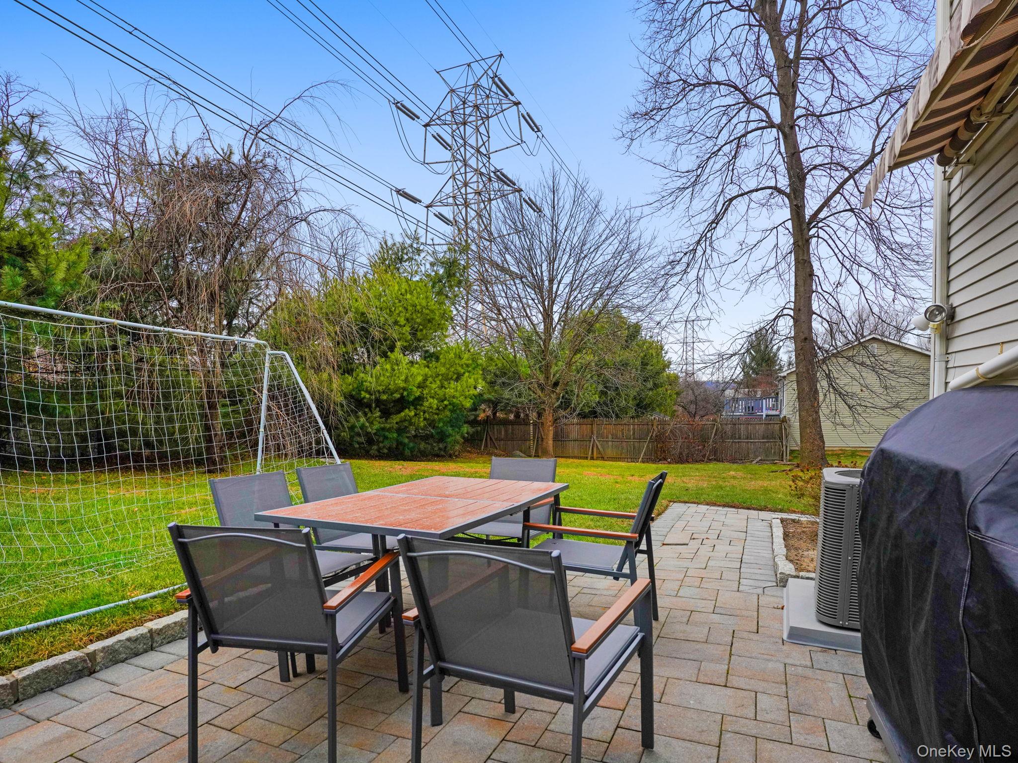 38 Kathwood Road White Plains, NY 10607 - Photo 38 of 44 Fenced backyard with a patio, grilling area, and outdoor dining area