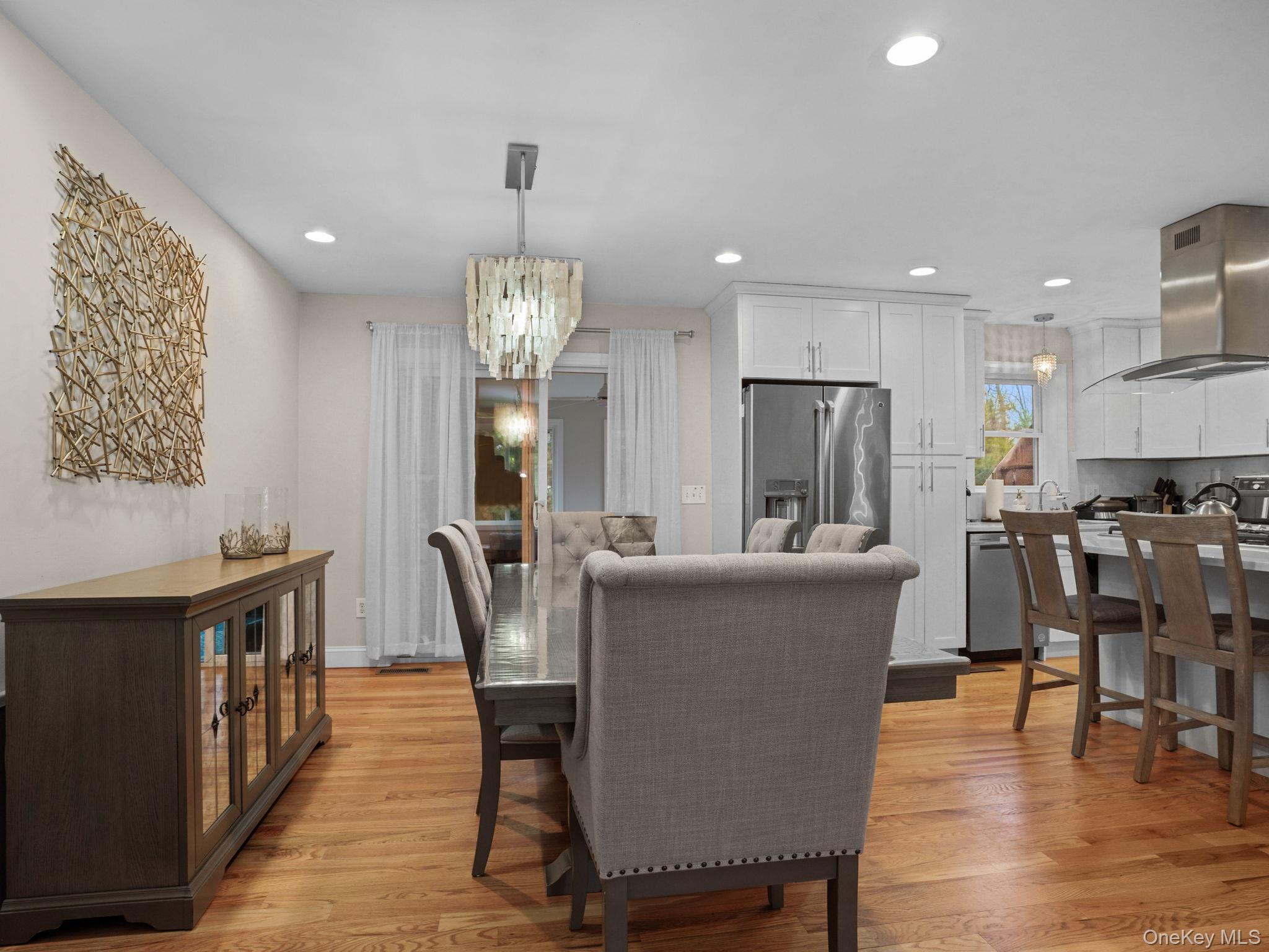 38 Kathwood Road White Plains, NY 10607 - Photo 9 of 44 Dining room featuring a chandelier, light wood-type flooring, and recessed lighting