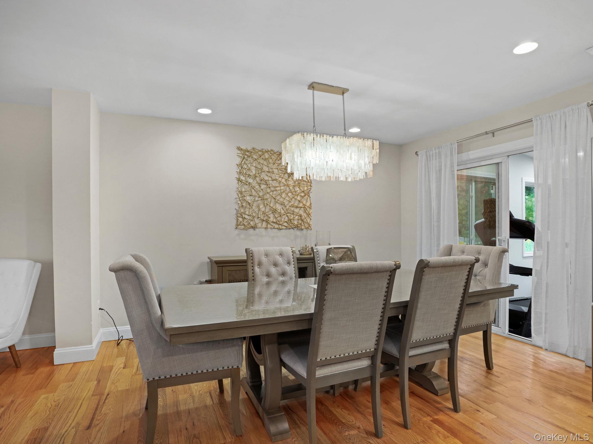 38 Kathwood Road White Plains, NY 10607 - Photo 10 of 44 Dining space featuring a chandelier, light wood-type flooring, and recessed lighting