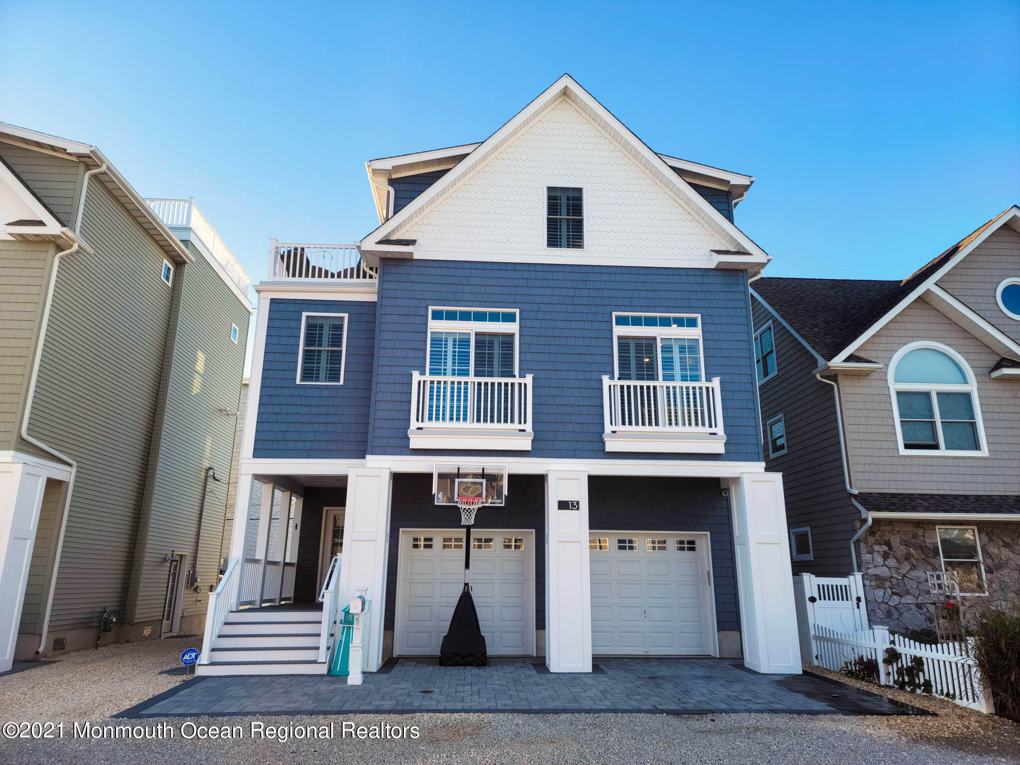 13 Surf Road Seaside Heights, NJ 08751 - Photo 1 of 64 a front view of a house with a yard
