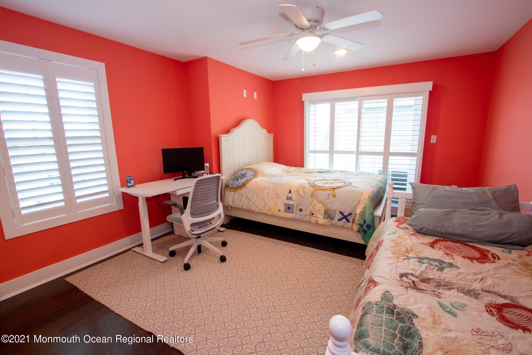 13 Surf Road Seaside Heights, NJ 08751 - Photo 32 of 64 a bedroom with a bed and a window