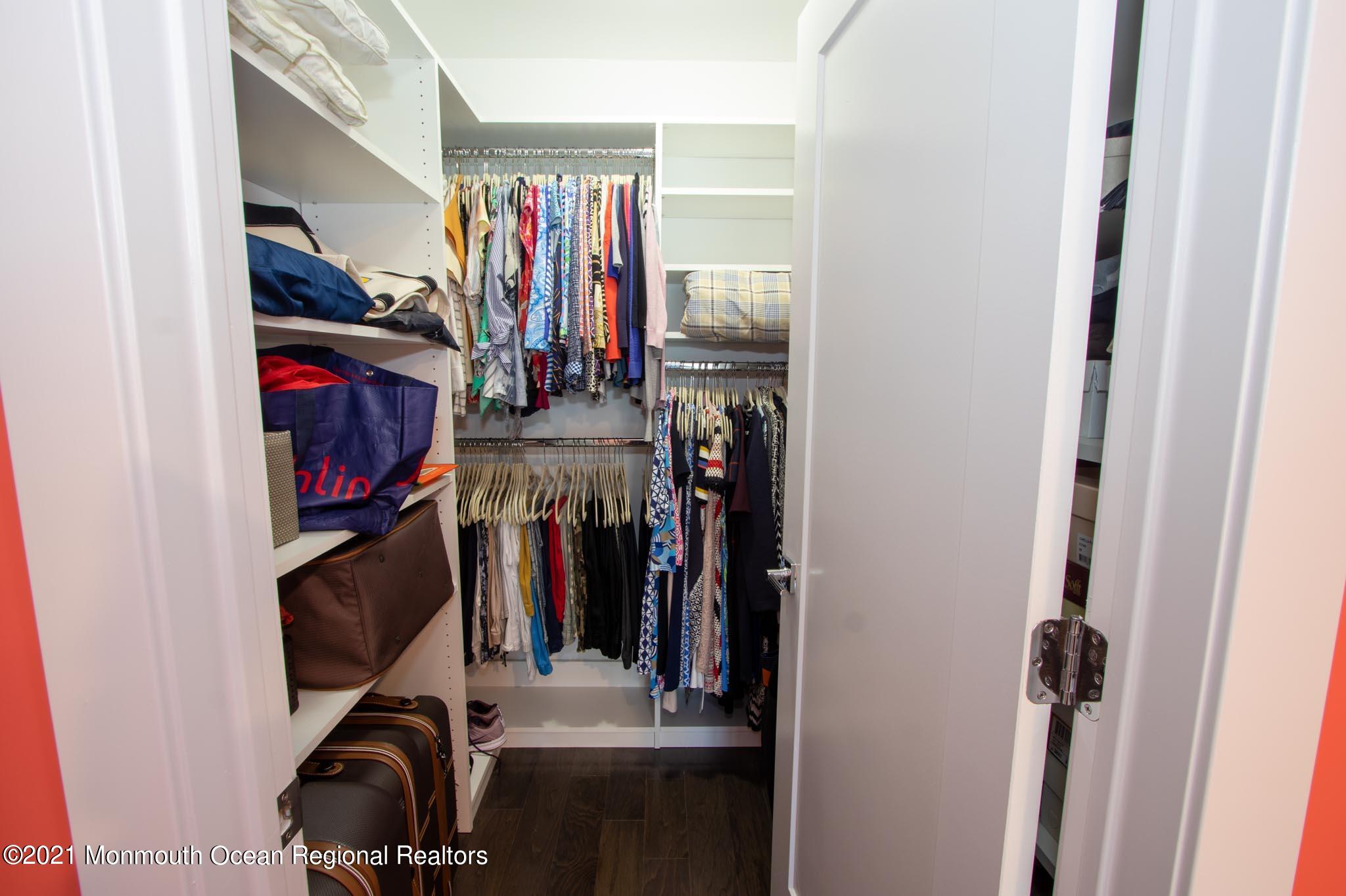 13 Surf Road Seaside Heights, NJ 08751 - Photo 34 of 64 a view of walk in closet with clothes