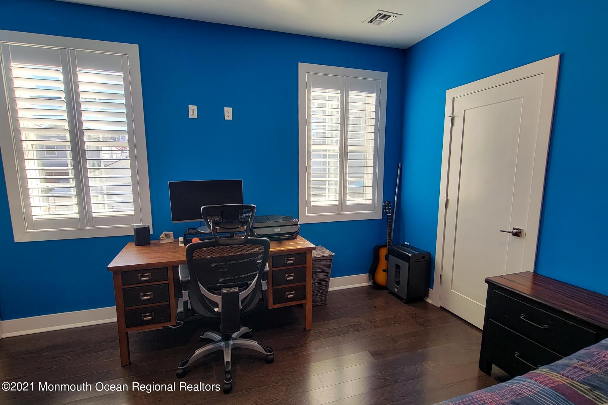 13 Surf Road Seaside Heights, NJ 08751 - Photo 48 of 64 a view of a workspace with furniture and a window