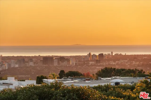 a view of city and mountain