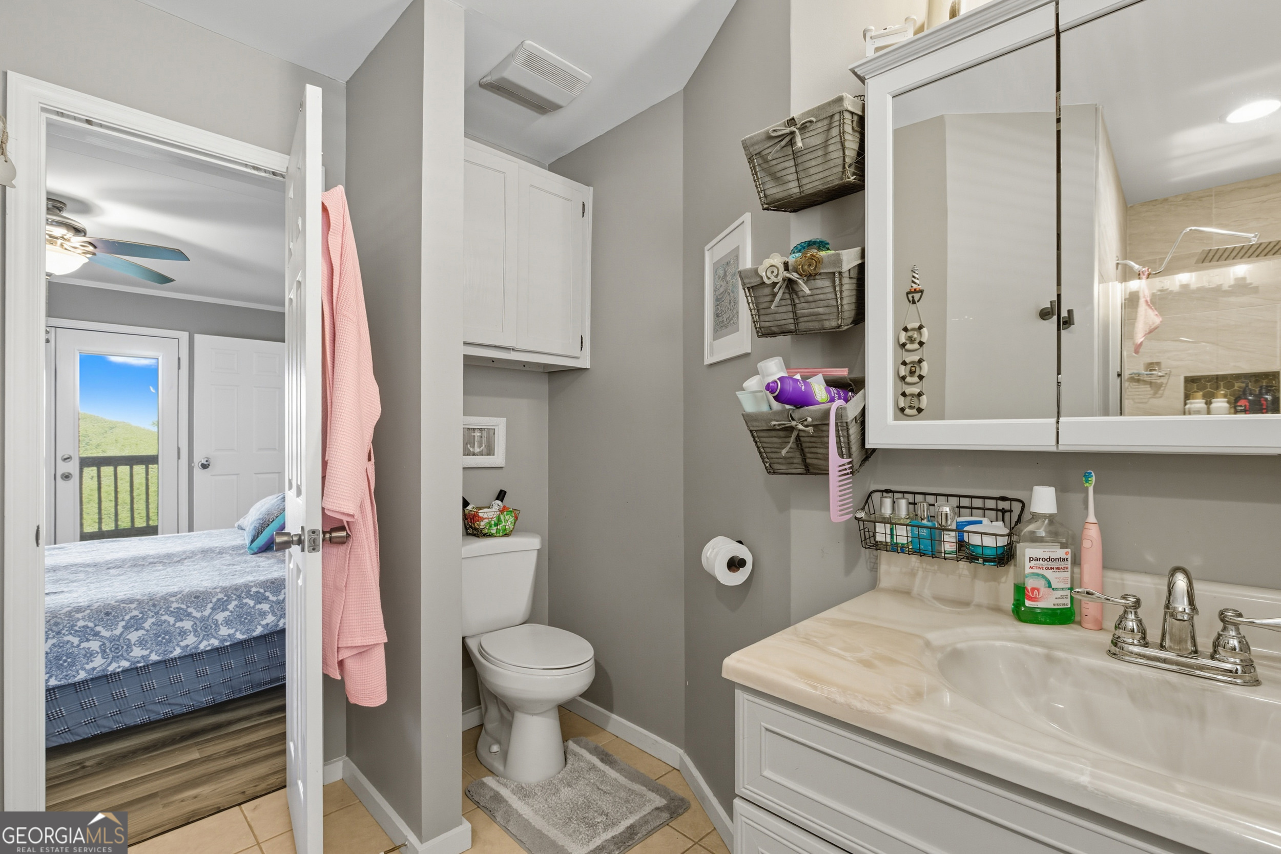 1947 Ivy Mountain Road Clarkesville, GA 30523 - Photo 20 of 48 a bathroom with a sink toilet and shower