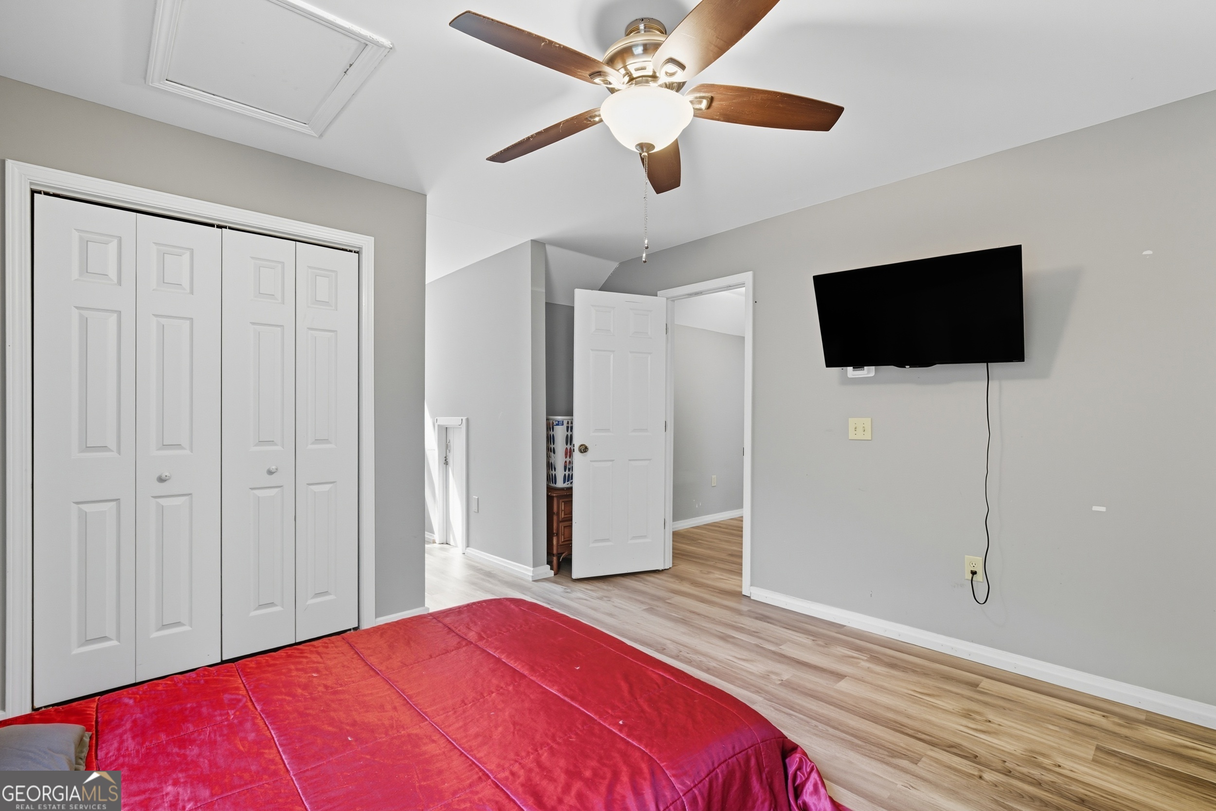 1947 Ivy Mountain Road Clarkesville, GA 30523 - Photo 25 of 48 a bedroom with a bed and a flat screen tv