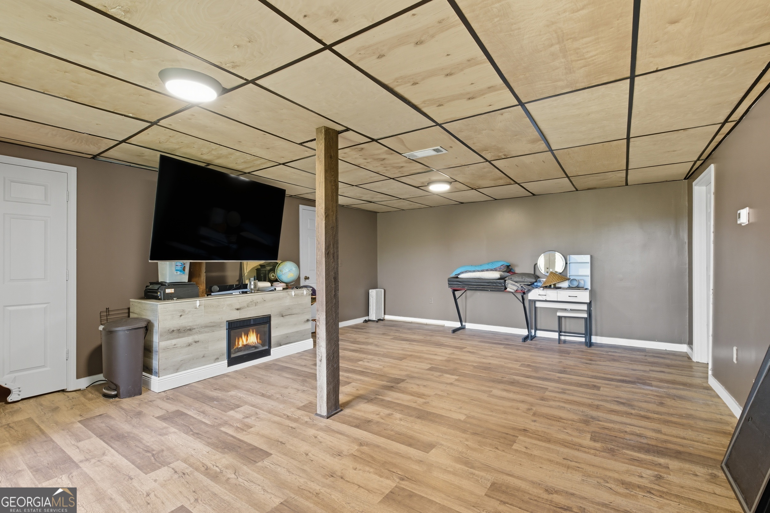 1947 Ivy Mountain Road Clarkesville, GA 30523 - Photo 30 of 48 a view of a livingroom with furniture and a flat screen tv