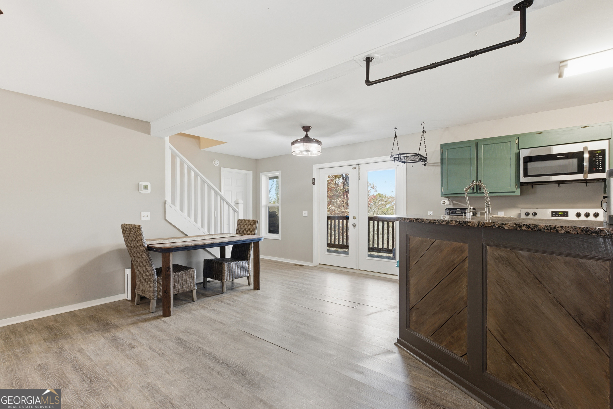 1947 Ivy Mountain Road Clarkesville, GA 30523 - Photo 8 of 48 a kitchen with stainless steel appliances granite countertop a refrigerator and microwave
