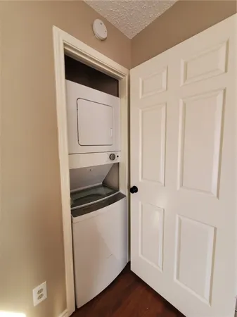 a utility room with washer and dryer