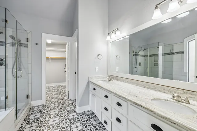 a bathroom with a bathtub and a shower