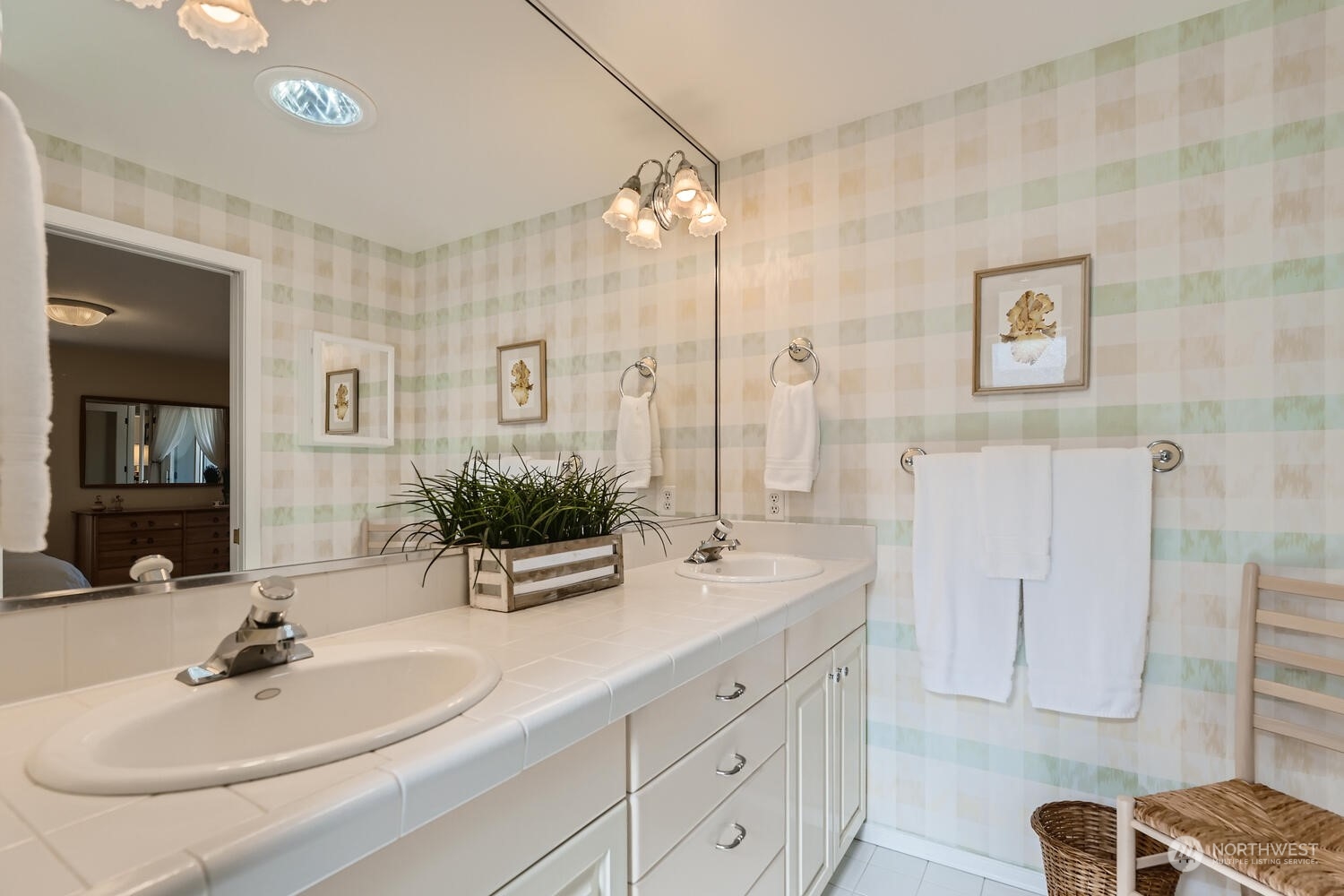 12823 Spanaway Loop Road South Tacoma, WA 98444 - Photo 18 of 38 a bathroom with 2 sink and a mirror
