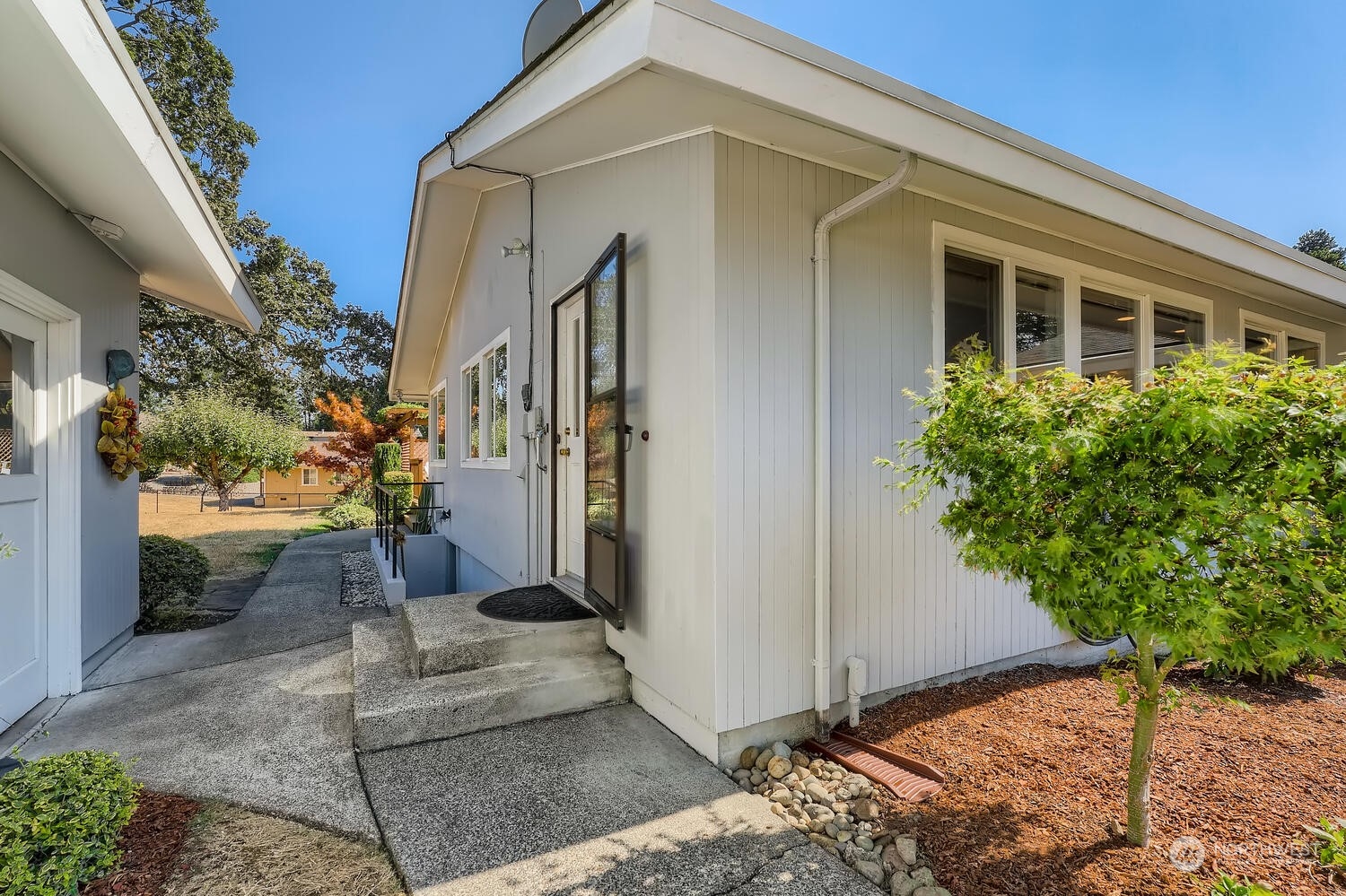 12823 Spanaway Loop Road South Tacoma, WA 98444 - Photo 27 of 38 a front view of a house