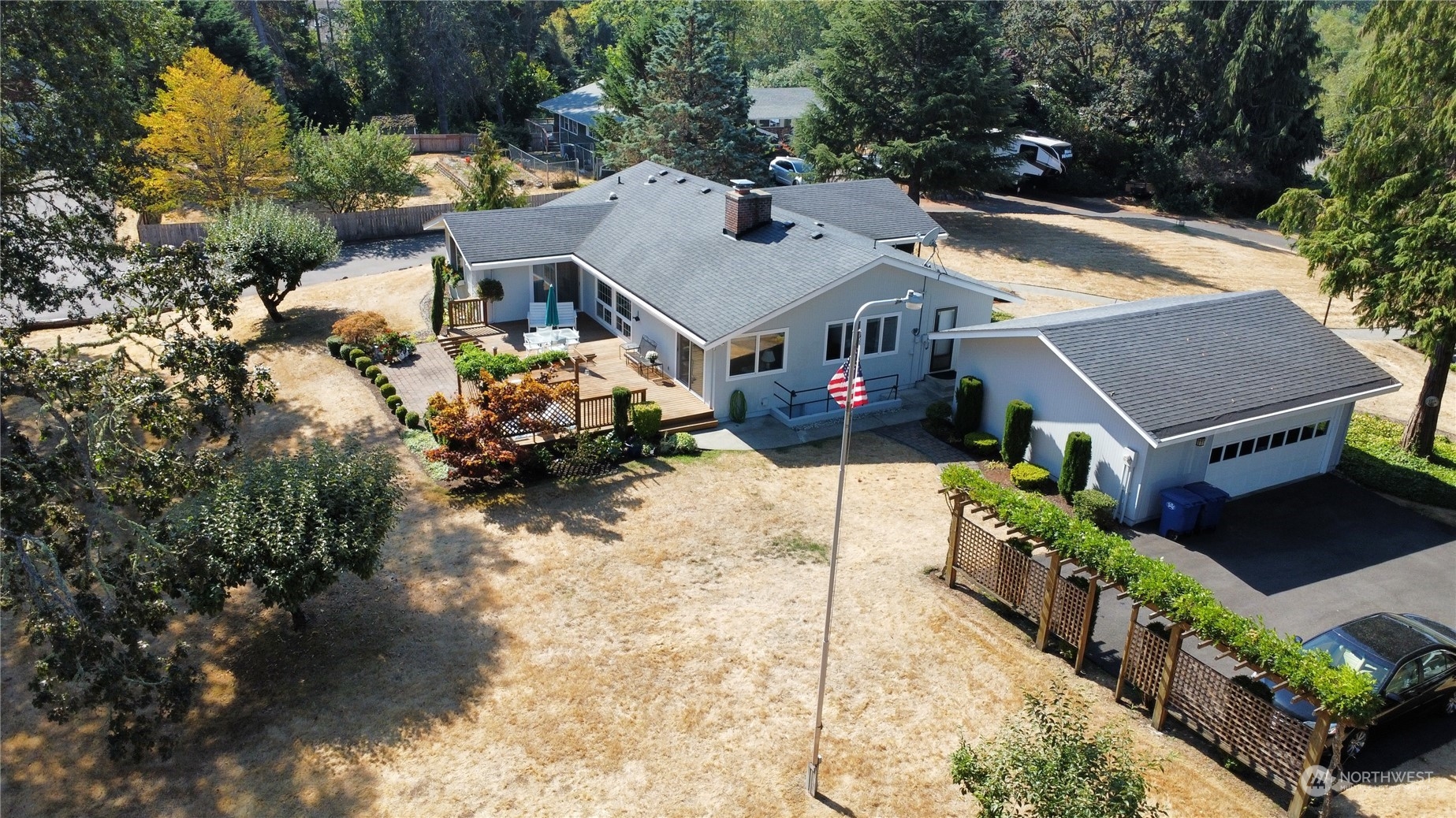 12823 Spanaway Loop Road South Tacoma, WA 98444 - Photo 33 of 38 an aerial view of a house with a yard