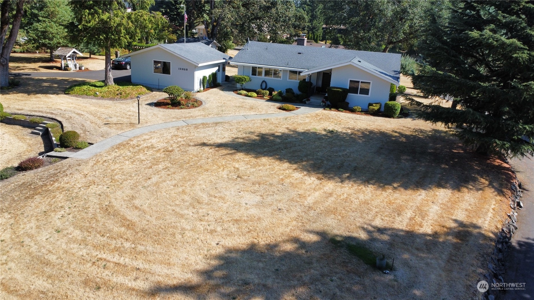 12823 Spanaway Loop Road South Tacoma, WA 98444 - Photo 36 of 38 a house view with a outdoor space