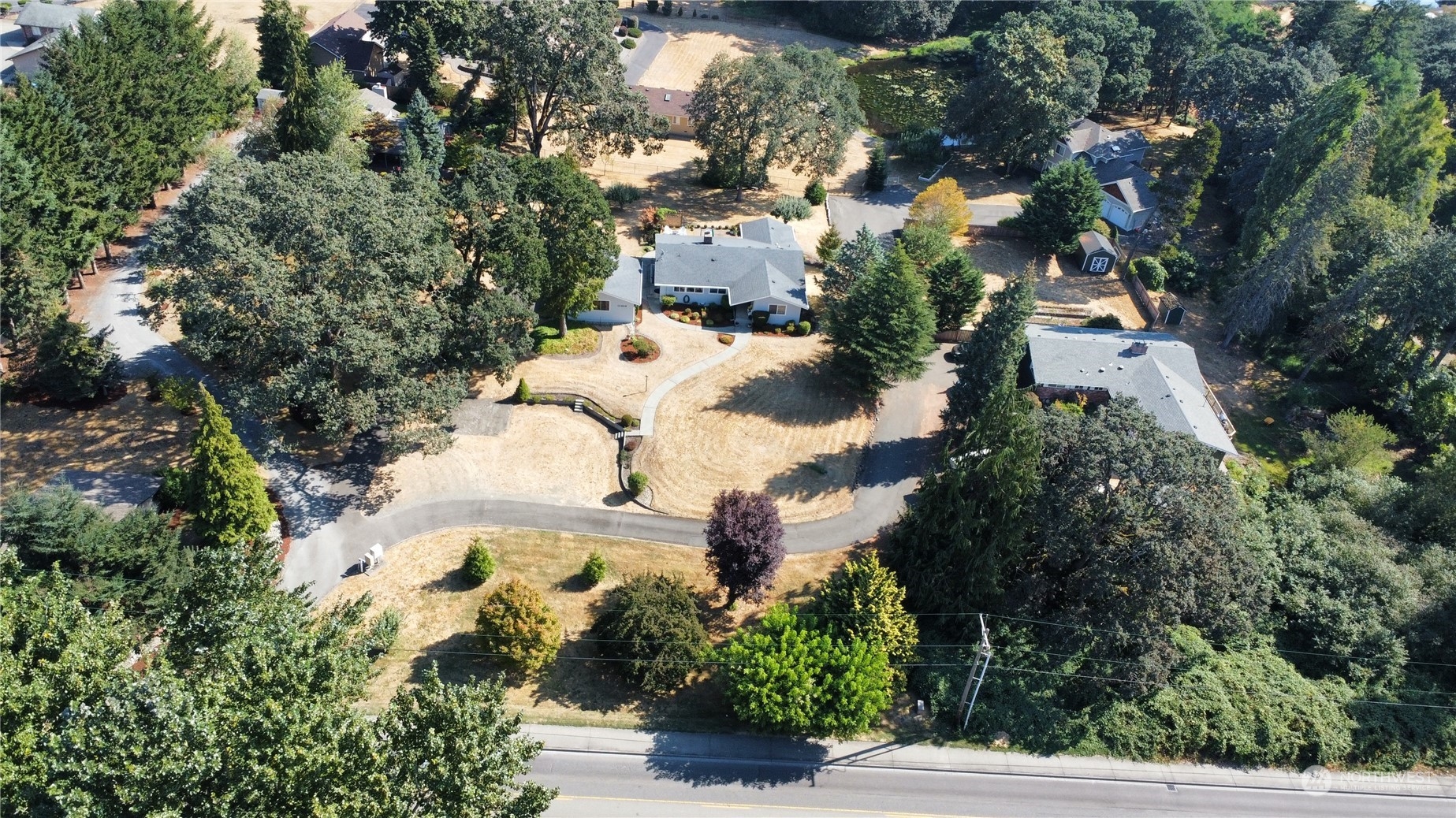12823 Spanaway Loop Road South Tacoma, WA 98444 - Photo 38 of 38 an aerial view of residential houses with outdoor space