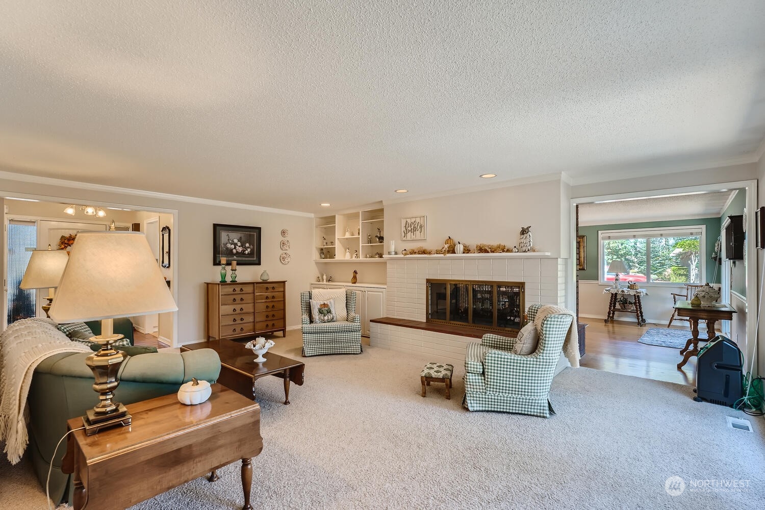 12823 Spanaway Loop Road South Tacoma, WA 98444 - Photo 7 of 38 a living room with furniture and a fireplace