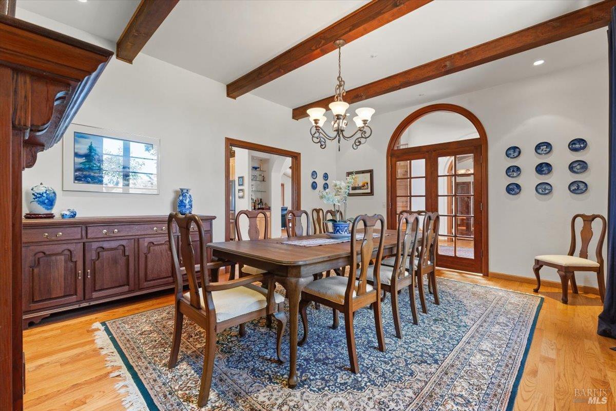 13404 Flora Ranch Road Healdsburg, CA 95448 - Photo 26 of 66 a view of a dining room with furniture