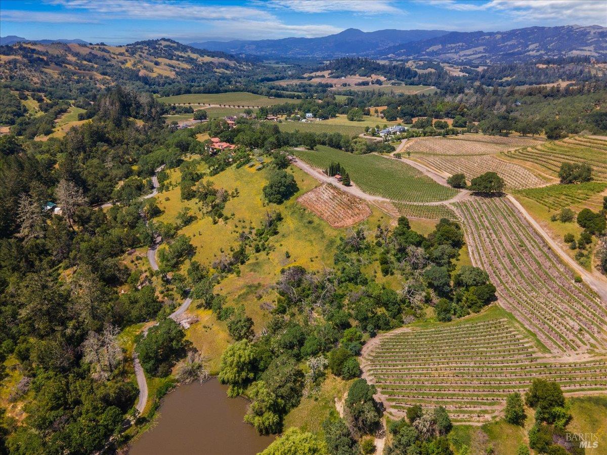 13404 Flora Ranch Road Healdsburg, CA 95448 - Photo 7 of 66 a view of a city with mountains in the background