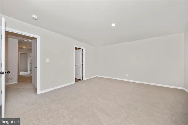 an empty room with an entryway