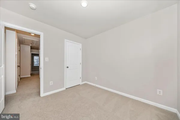 an empty room with closet