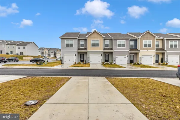 a front view of building with street