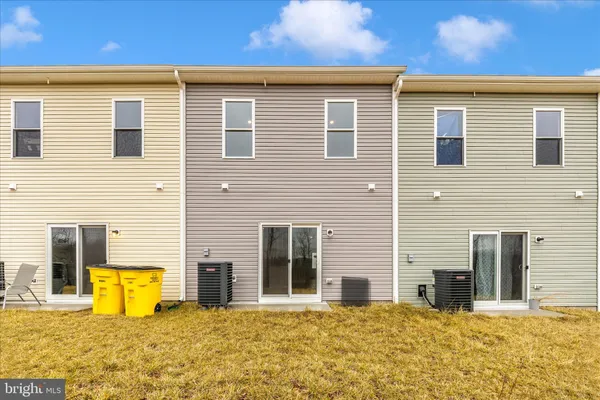 a large white building with a white roof