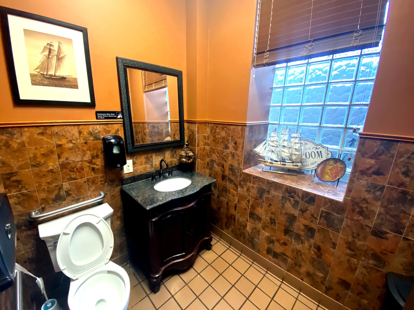 1100 South State Street Lockport, IL 60441 - Photo 17 of 18 a bathroom with a sink mirror vanity and toilet