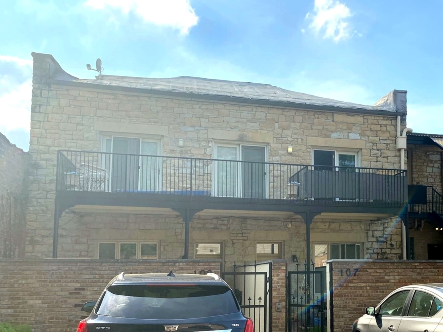 1100 South State Street Lockport, IL 60441 - Photo 7 of 18 a car parked in front of a building