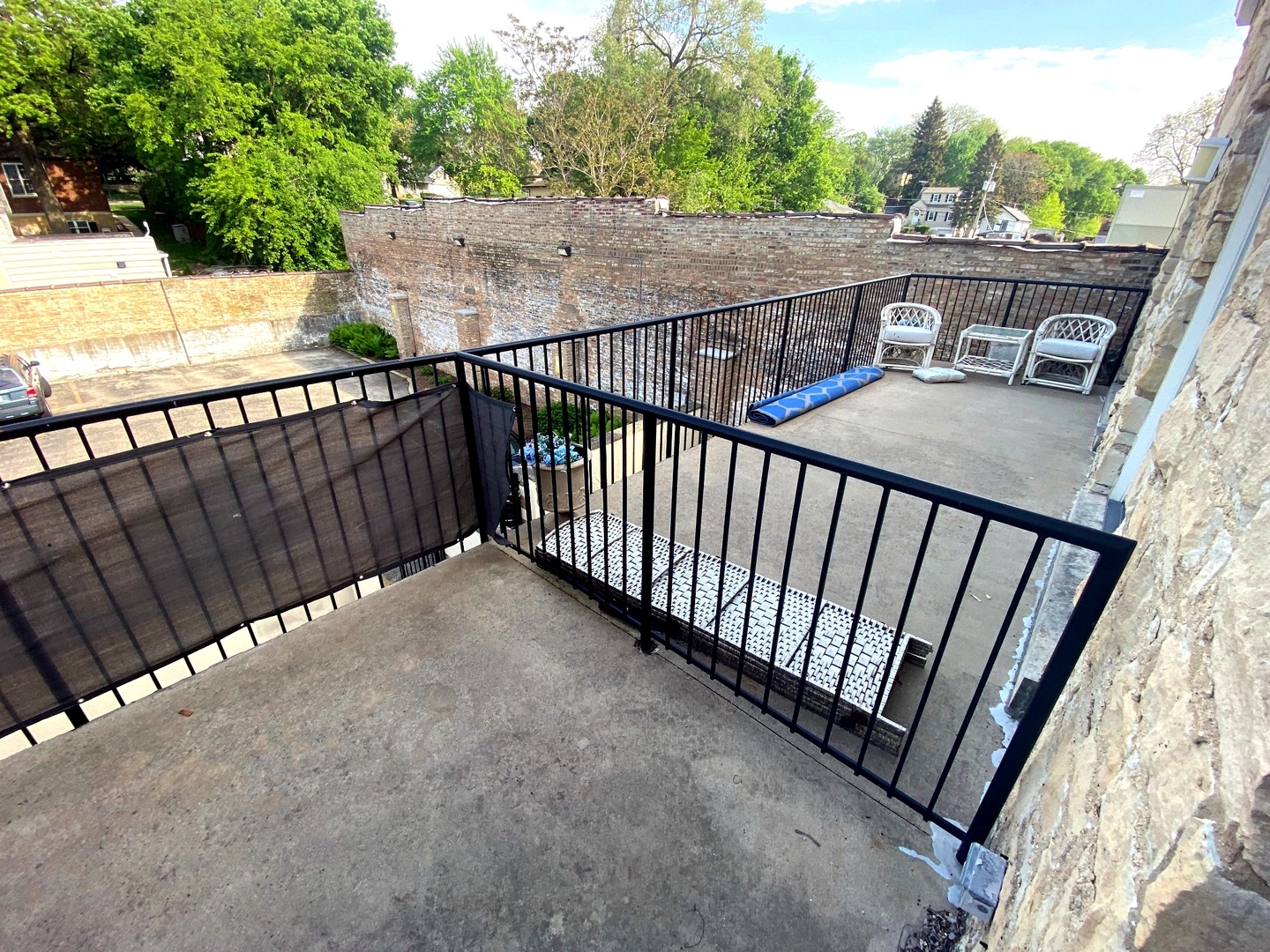 1100 South State Street Lockport, IL 60441 - Photo 8 of 18 a balcony with an outdoor space