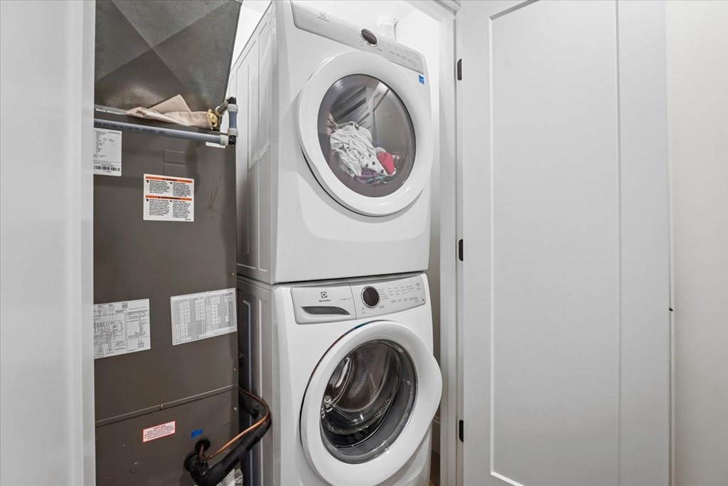 2-4 Elm Street, Unit 2B Boston, MA 02122 - Photo 21 of 27 a utility room with dryer and washer