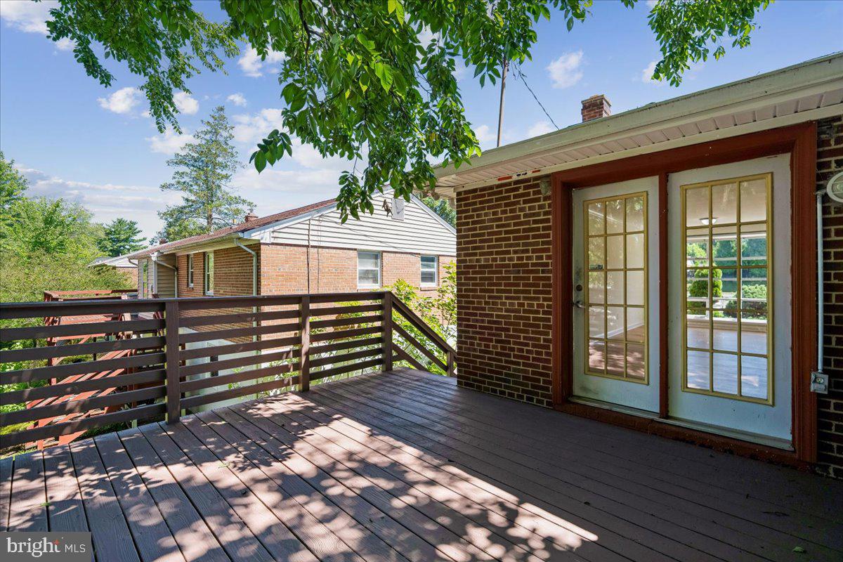13012 Georgia Avenue Silver Spring, MD 20906 - Photo 27 of 31 Sunny deck with lush greenery.