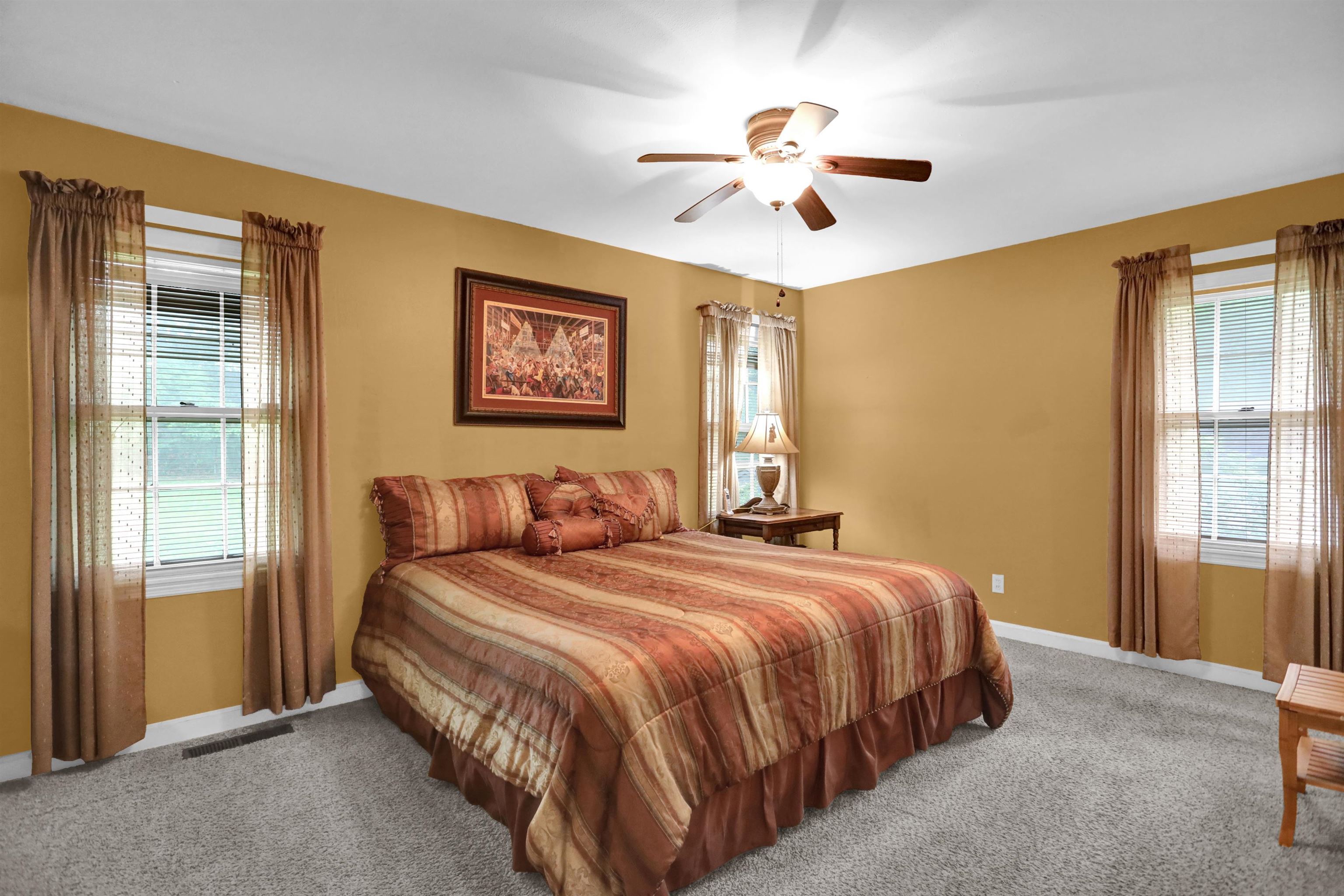 1277 Old Hickory Road Memphis, TN 38116 - Photo 14 of 29 Bedroom with visible vents, baseboards, carpet floors, and multiple windows