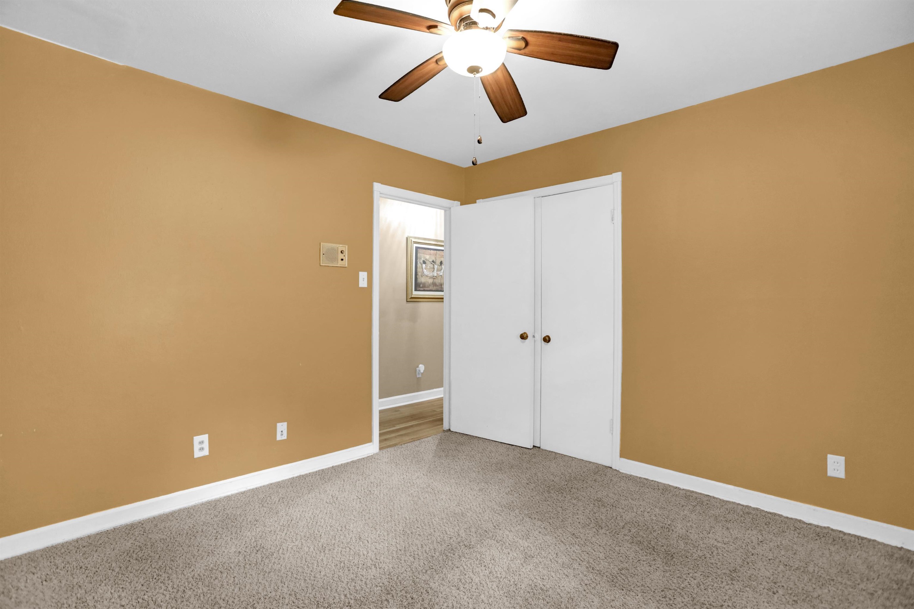 1277 Old Hickory Road Memphis, TN 38116 - Photo 20 of 29 Unfurnished bedroom with carpet flooring, a ceiling fan, baseboards, and a closet