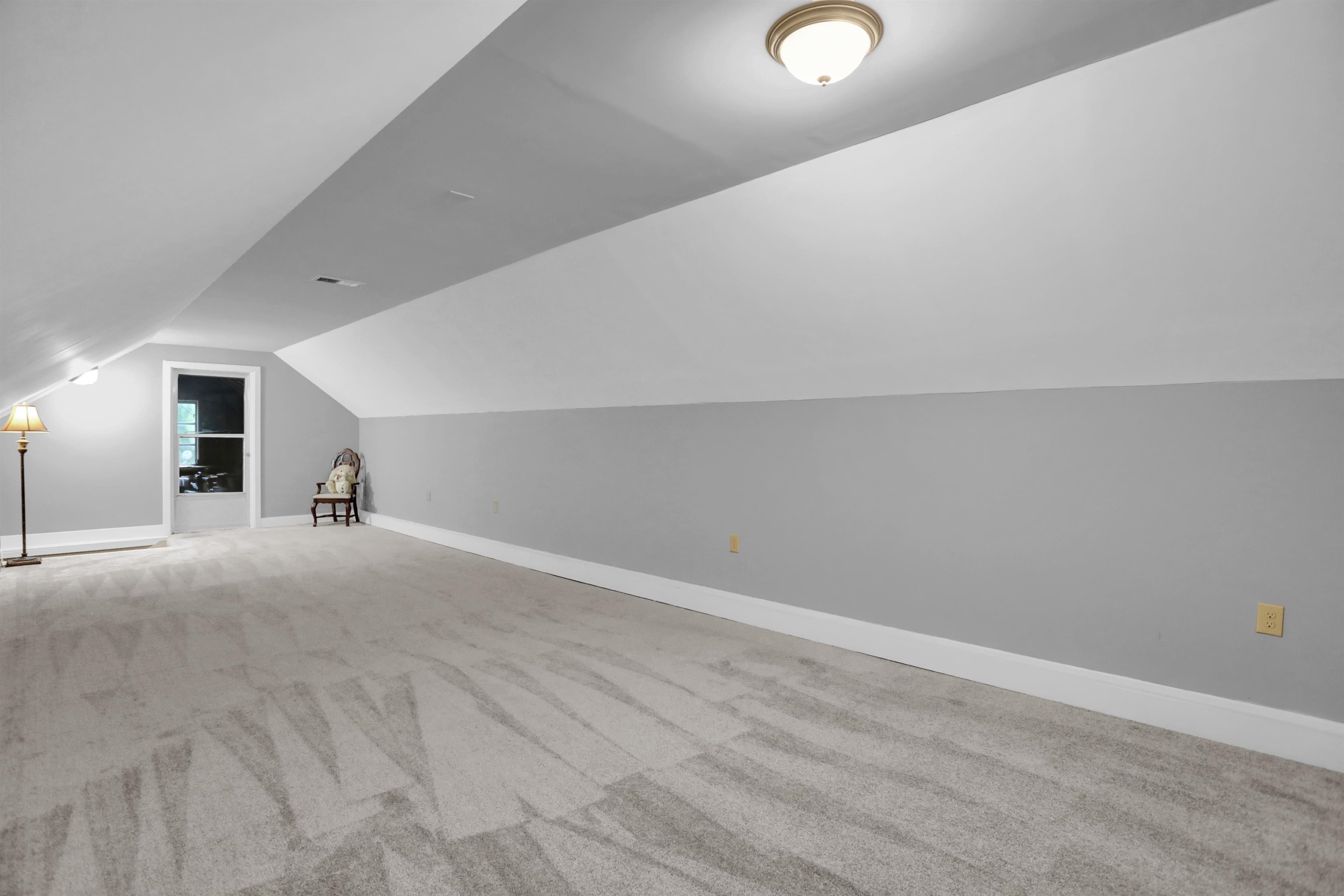 1277 Old Hickory Road Memphis, TN 38116 - Photo 22 of 29 Bonus room with carpet floors, baseboards, and vaulted ceiling